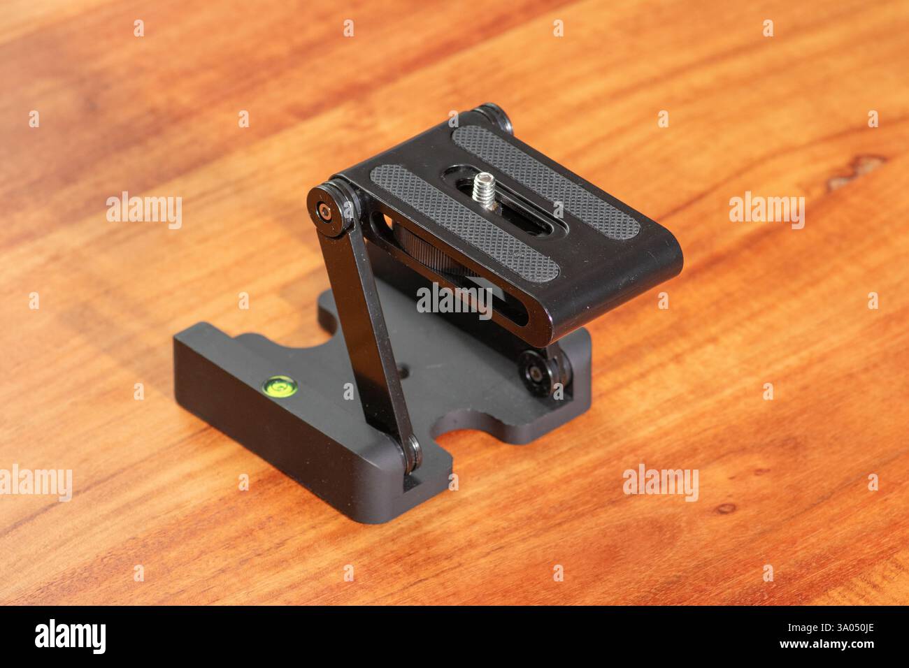 Small Camera Mount Design Close-up image showcasing a compact adjustable camera mount on a light ...
