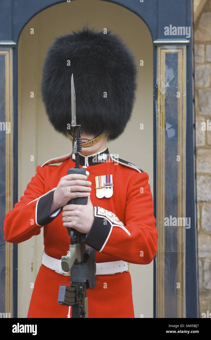 Guard holding rifle in both hands, London, UK United Kingdom England ...