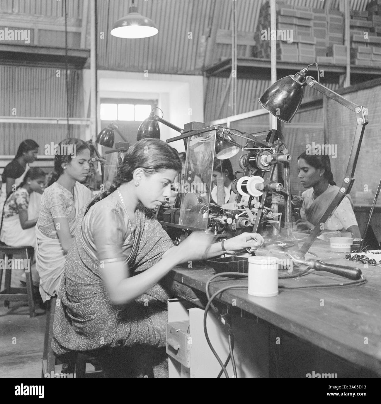 Workers at the assembly line, telephone factory, manufacturing of ...