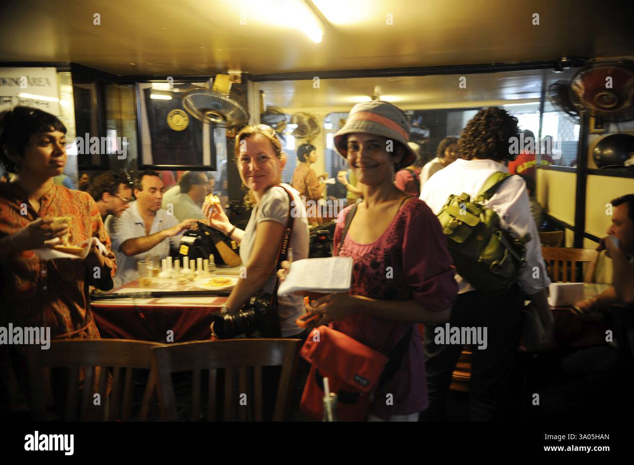Leopard Cafe People inside the Leopold Cafe, after terrorist attack by Deccan ...