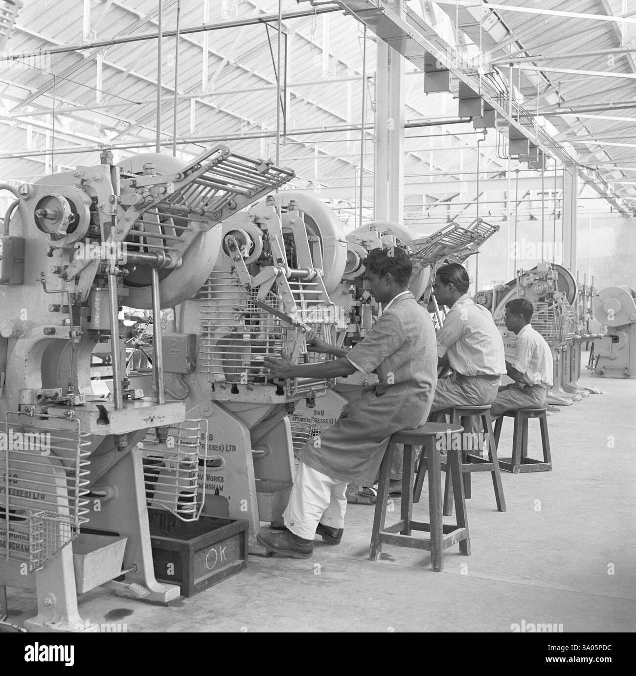 Workers at the assembly line, telephone factory, manufacturing of ...