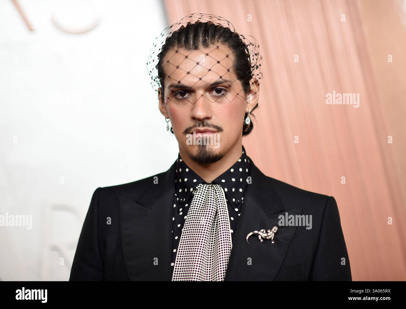 Omar Apollo arrives at the Oscars on Sunday, March 2, 2025, at the