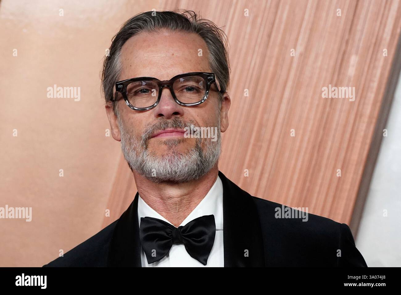 Guy Pearce arrives at the Oscars on Sunday, March 2, 2025, at the Dolby