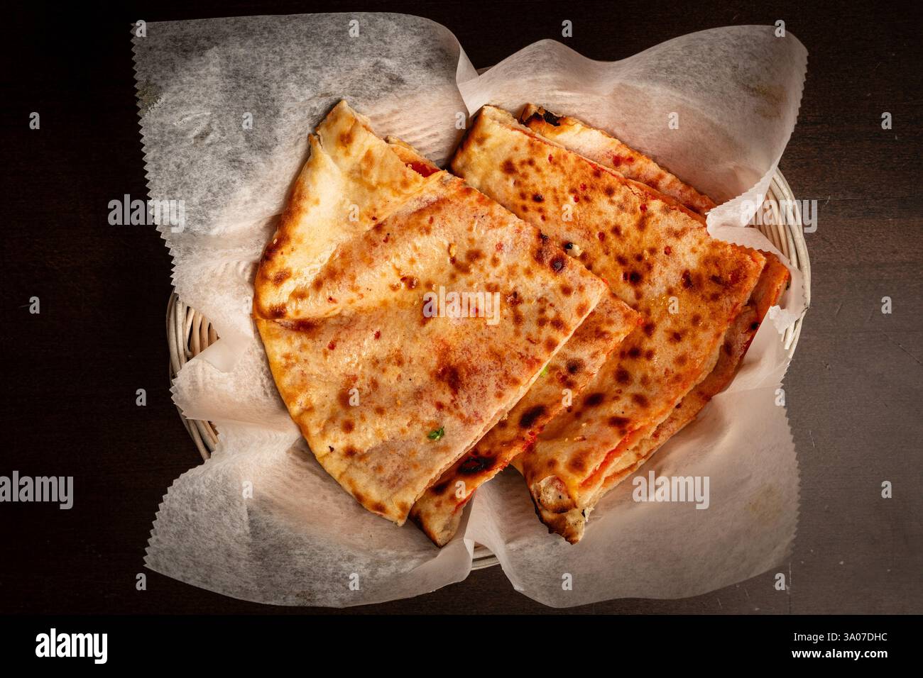Cheese naan in a basket Stock Photo