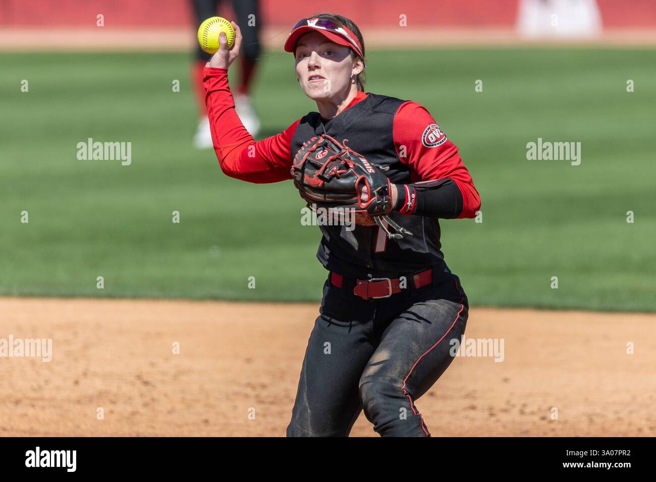 SIUE infielder Kaylynn Salyars (7) throws to first base for an out ...