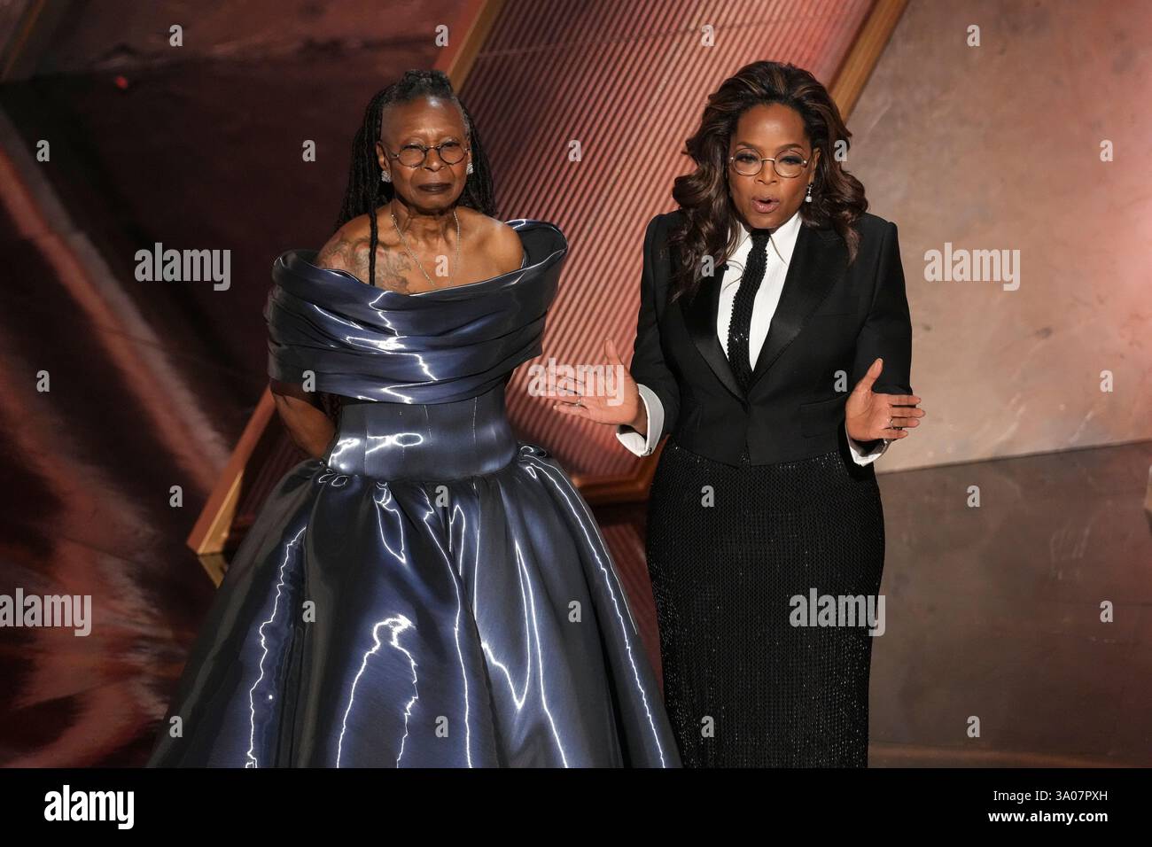 Whoopi Goldberg, left, and Oprah pay tribute to Quincy Jones during the