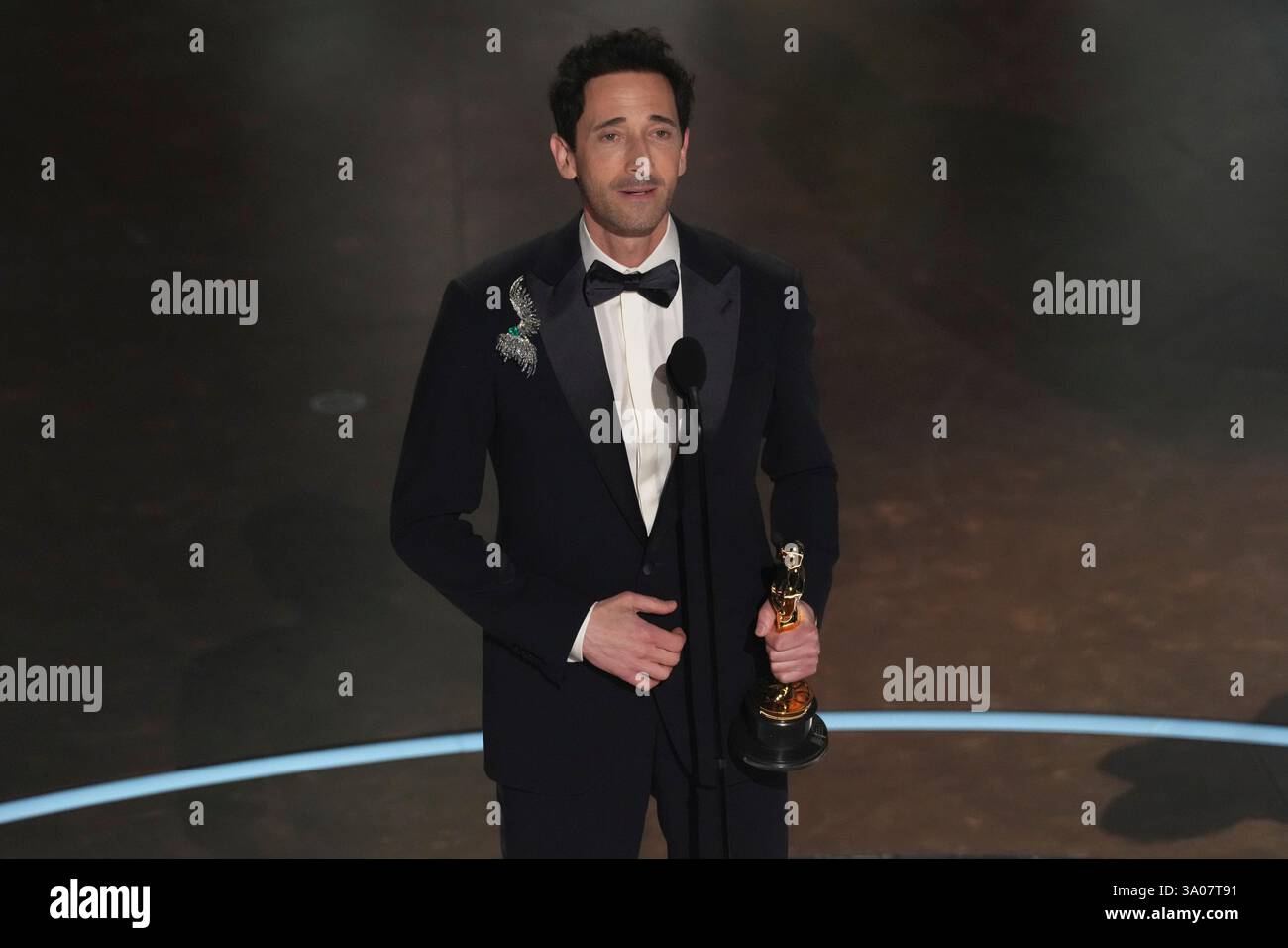 Adrien Brody accepts the award for best performance by an actor in a ...