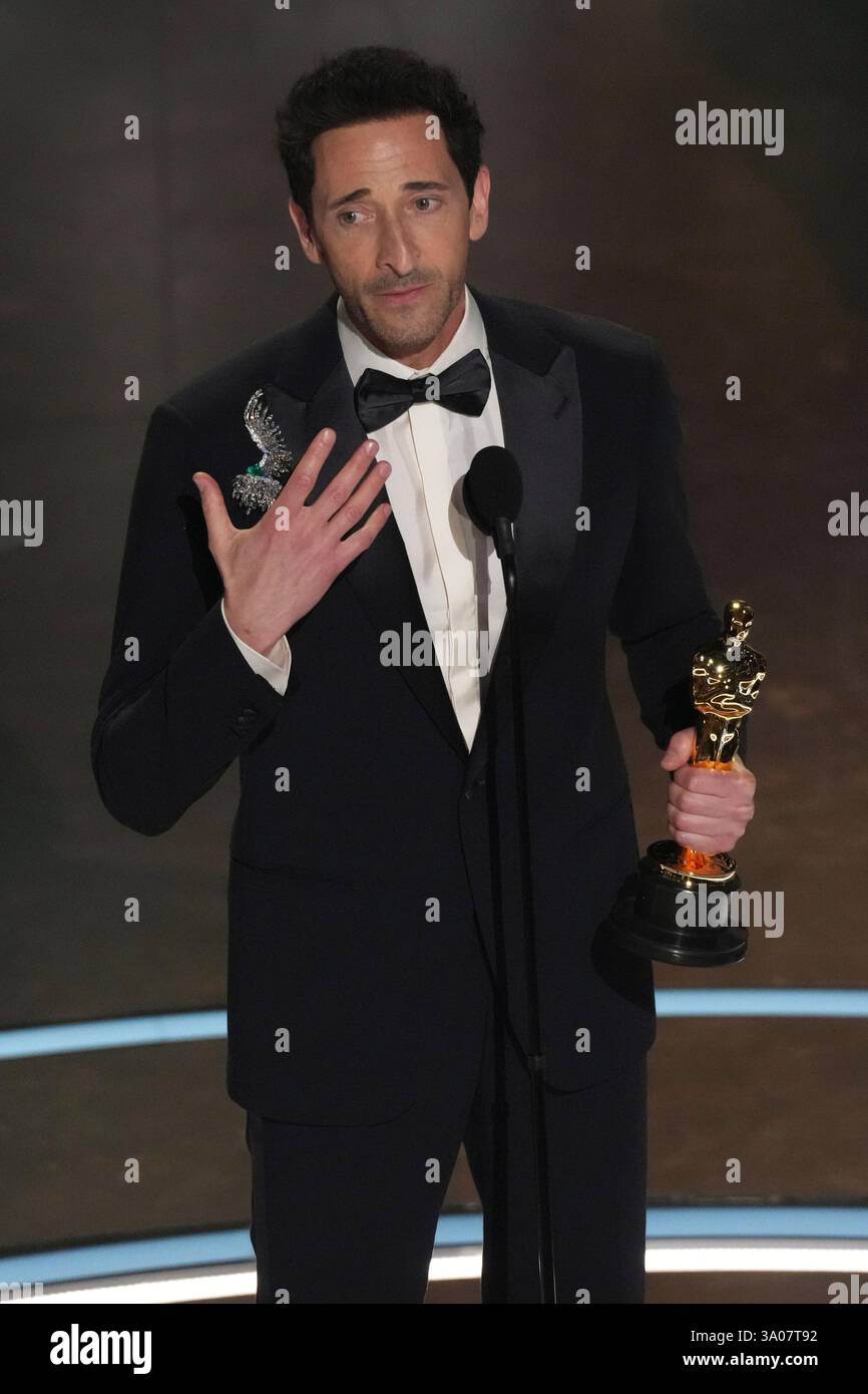 Adrien Brody accepts the award for best performance by an actor in a ...