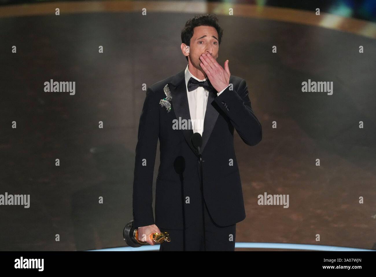Adrien Brody accepts the award for best performance by an actor in a ...