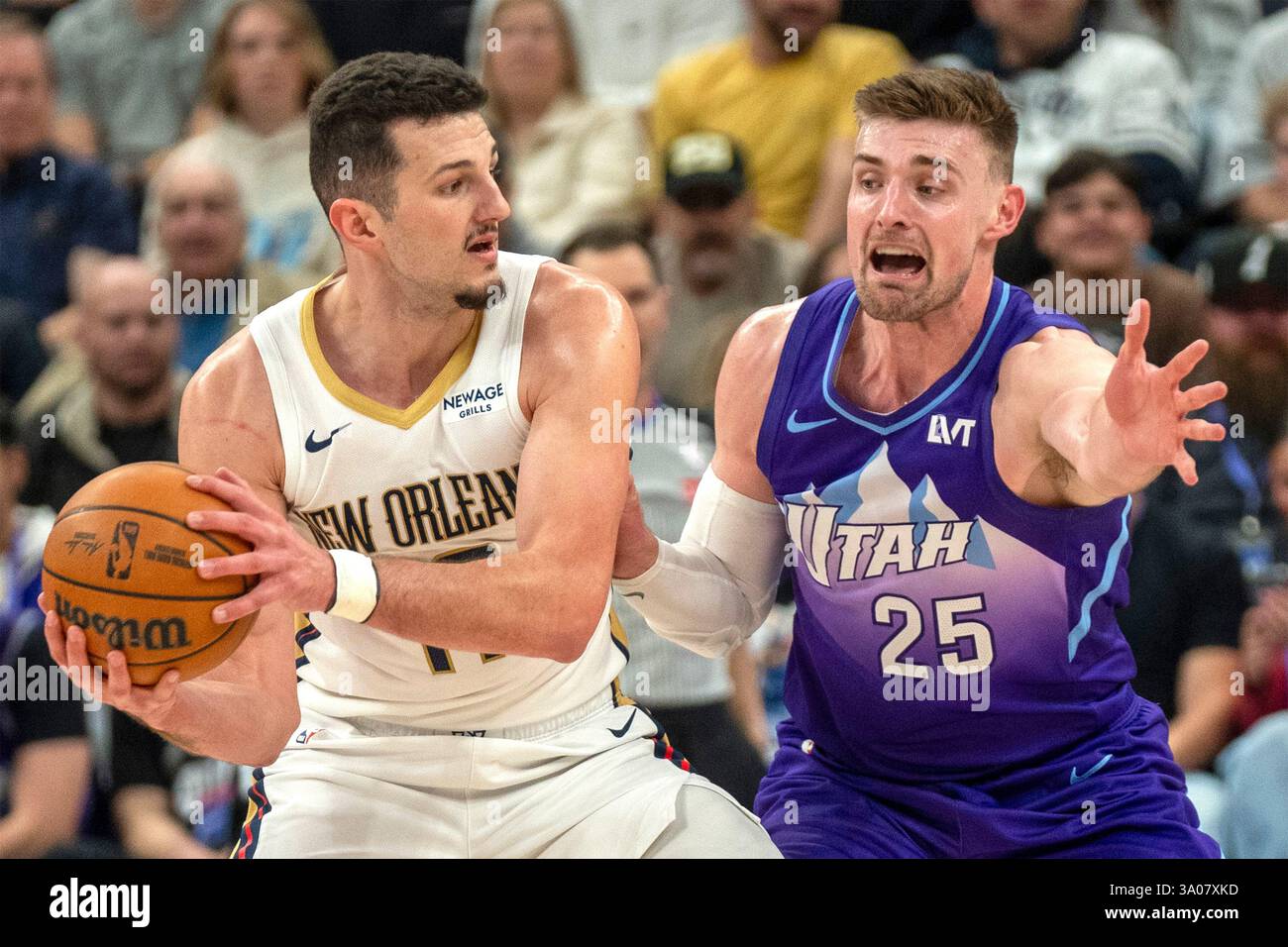 Matkovic Nba New Orleans Pelicans center Karlo Matkovic, left, looks to pass as Utah ...