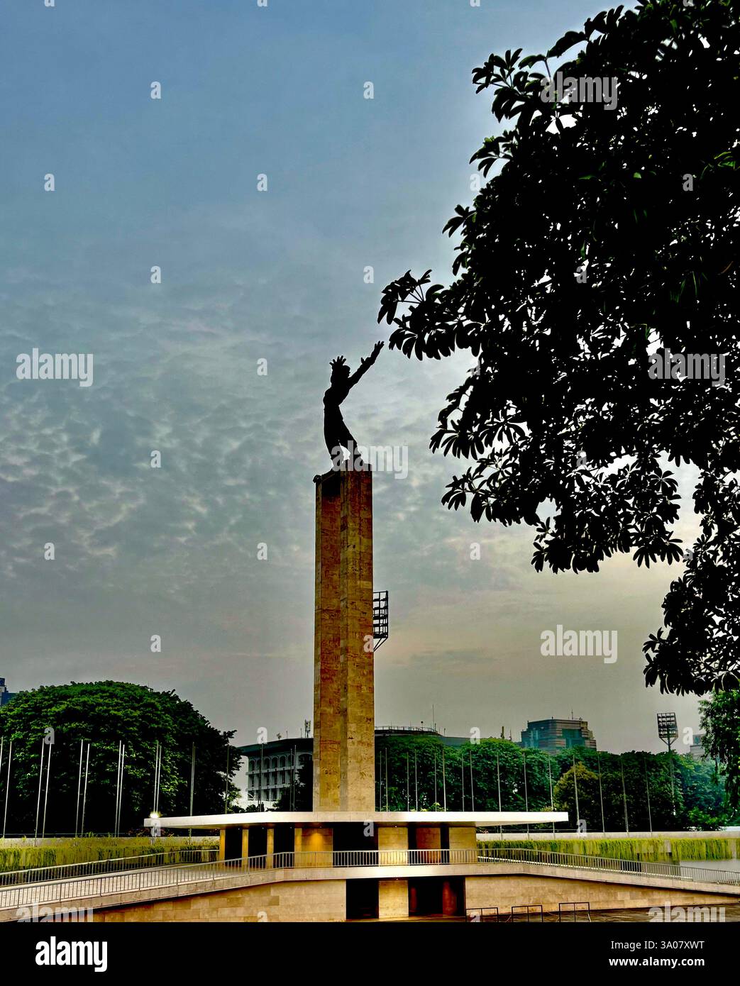 The West Irian Liberation Monument stands tall in Jakarta, symbolizing Indonesia's relentless struggle to reclaim its territory. - Smartphone Captured Stock Image