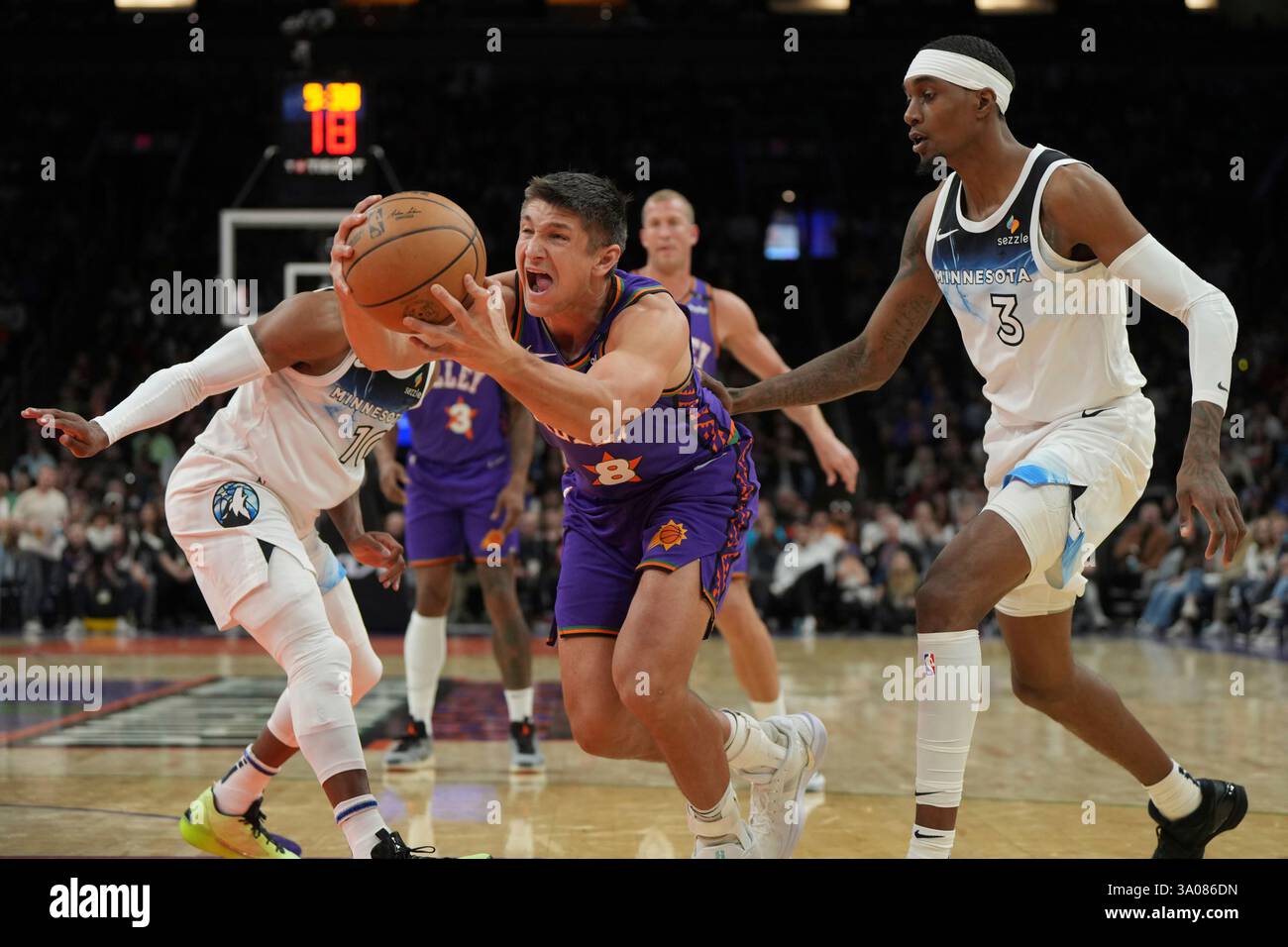 Phoenix Suns guard Grayson Allen (8) drives between Minnesota ...