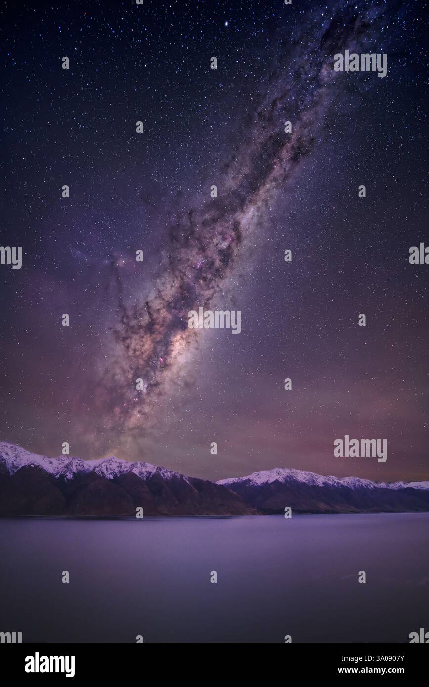 Milky Way core rising above Lake Hawea, South Island, New Zealand Stock ...