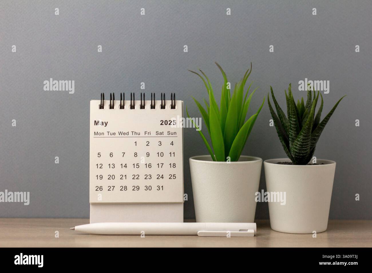 Hello May. May 2025 planning calendar on gray background Stock Photo