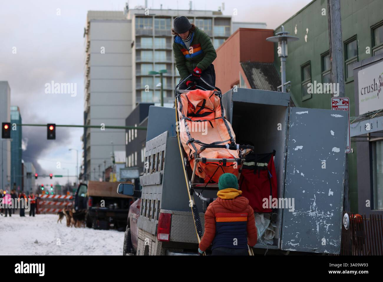 Musher Calvin Daugherty (25), of Eagle River, Alaska, passes a sled ...