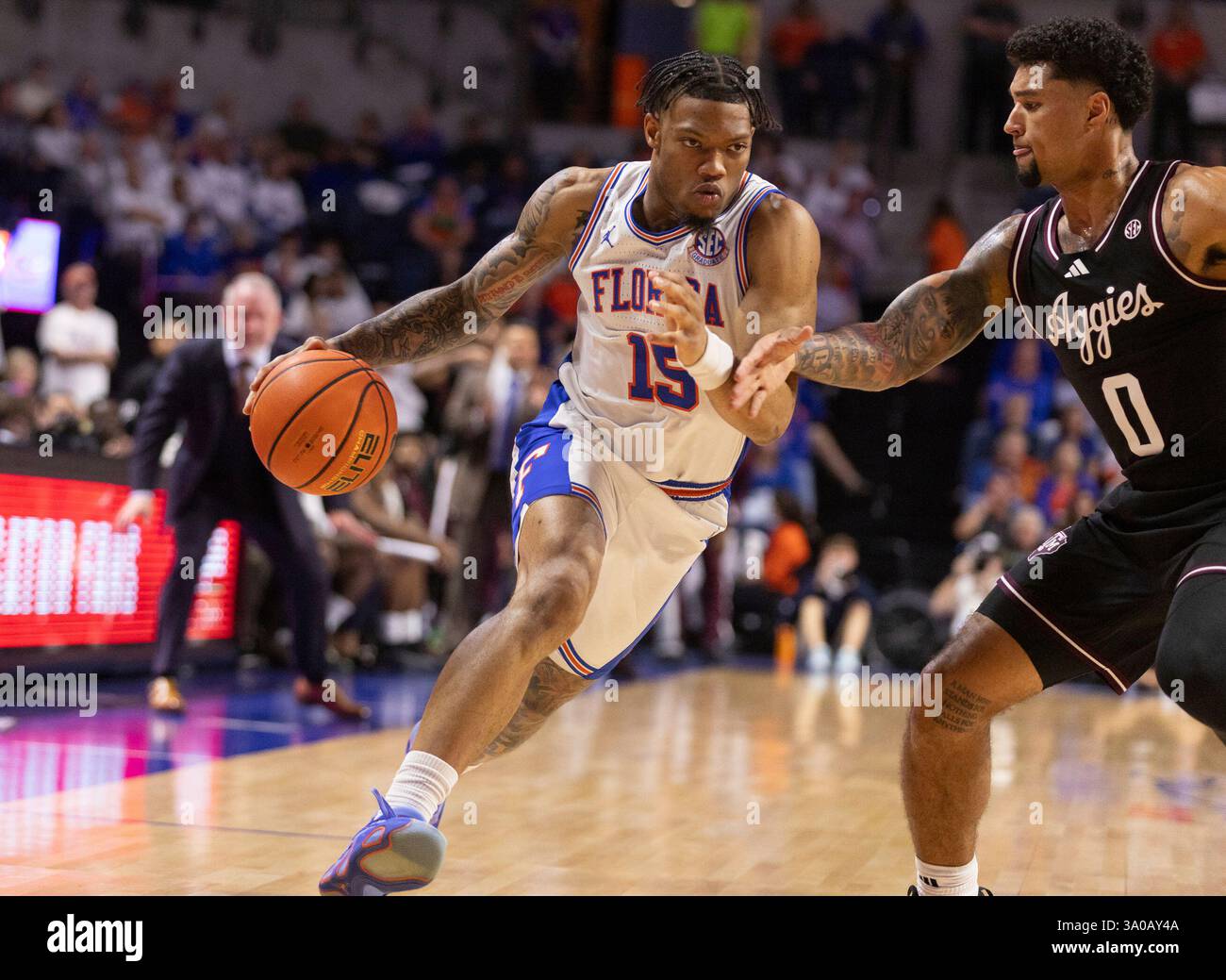 Florida guard Alijah Martin (15) drives against Texas A&M guard Jace ...