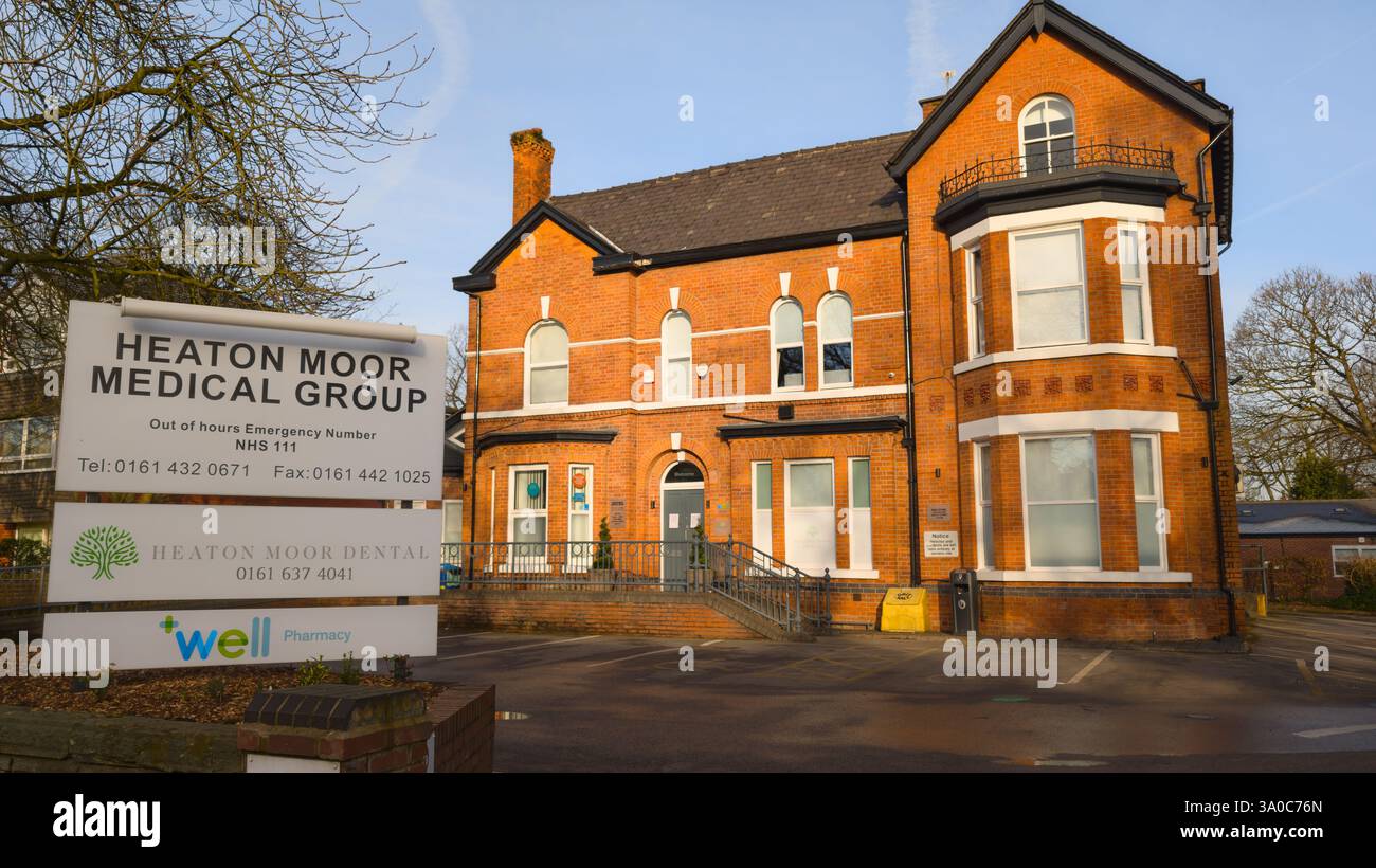 Heaton Moor Medical Group with sign for dentist and pharmacy. Doctors surgery, Stockport Greater Manchester UK - Smartphone Captured Stock Image