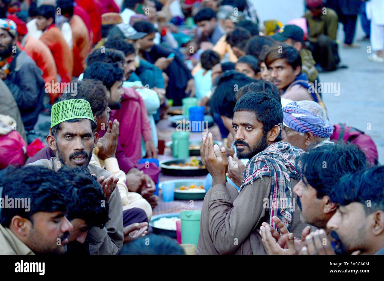 Faithful Muslims are breaking the fast (Iftar) during the Holy Month of ...