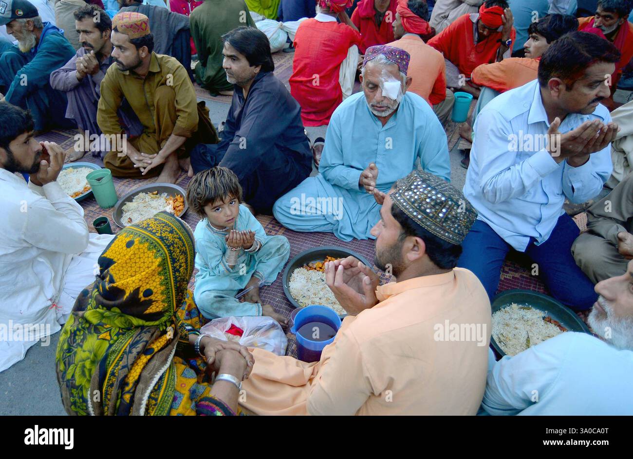 Faithful Muslims are breaking the fast (Iftar) during the Holy Month of ...