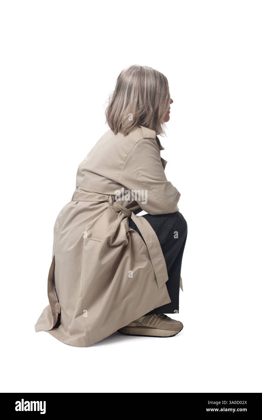 side-view-of-a-woman-squatting-on-white-background-stock-photo-alamy