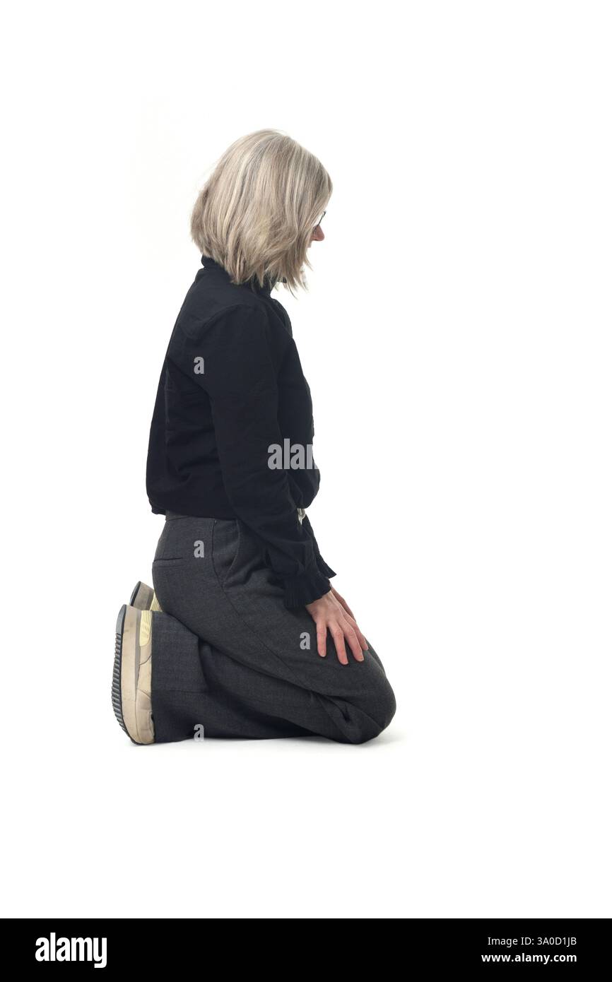 Pants kneeling looking hi-res stock photography and images - Alamy