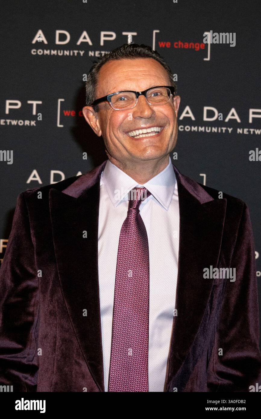 Mark Greatrex walks the red carpet at the 2025 ADAPT Leadership Awards ...