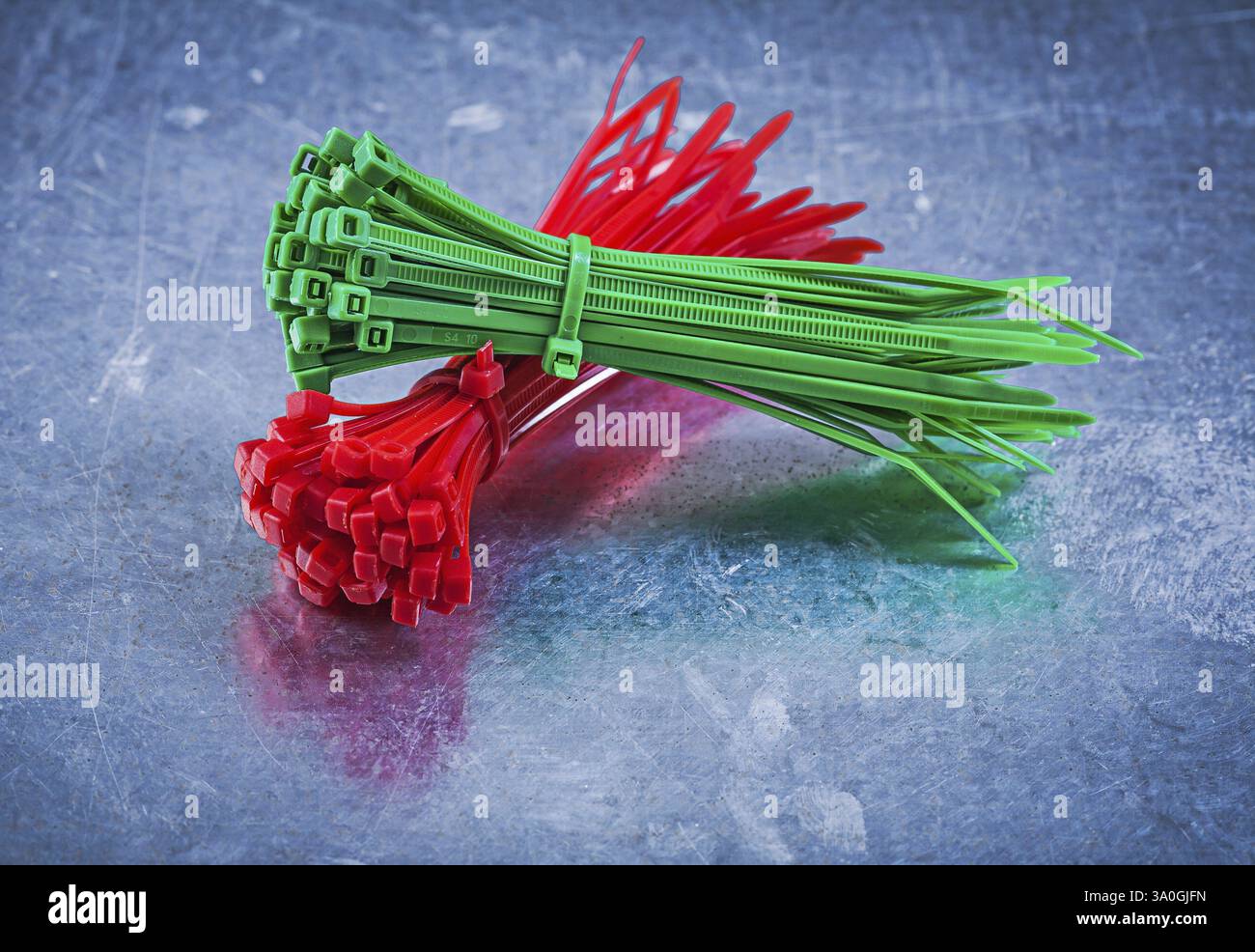 Cable ties on metallic background construction concept Stock Photo