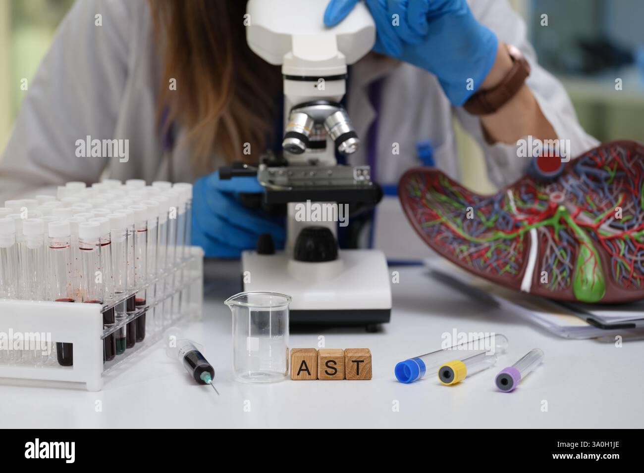 Engaging in comprehensive Laboratory Research utilizing Microscope with Sample Analysis techniques Stock Photo