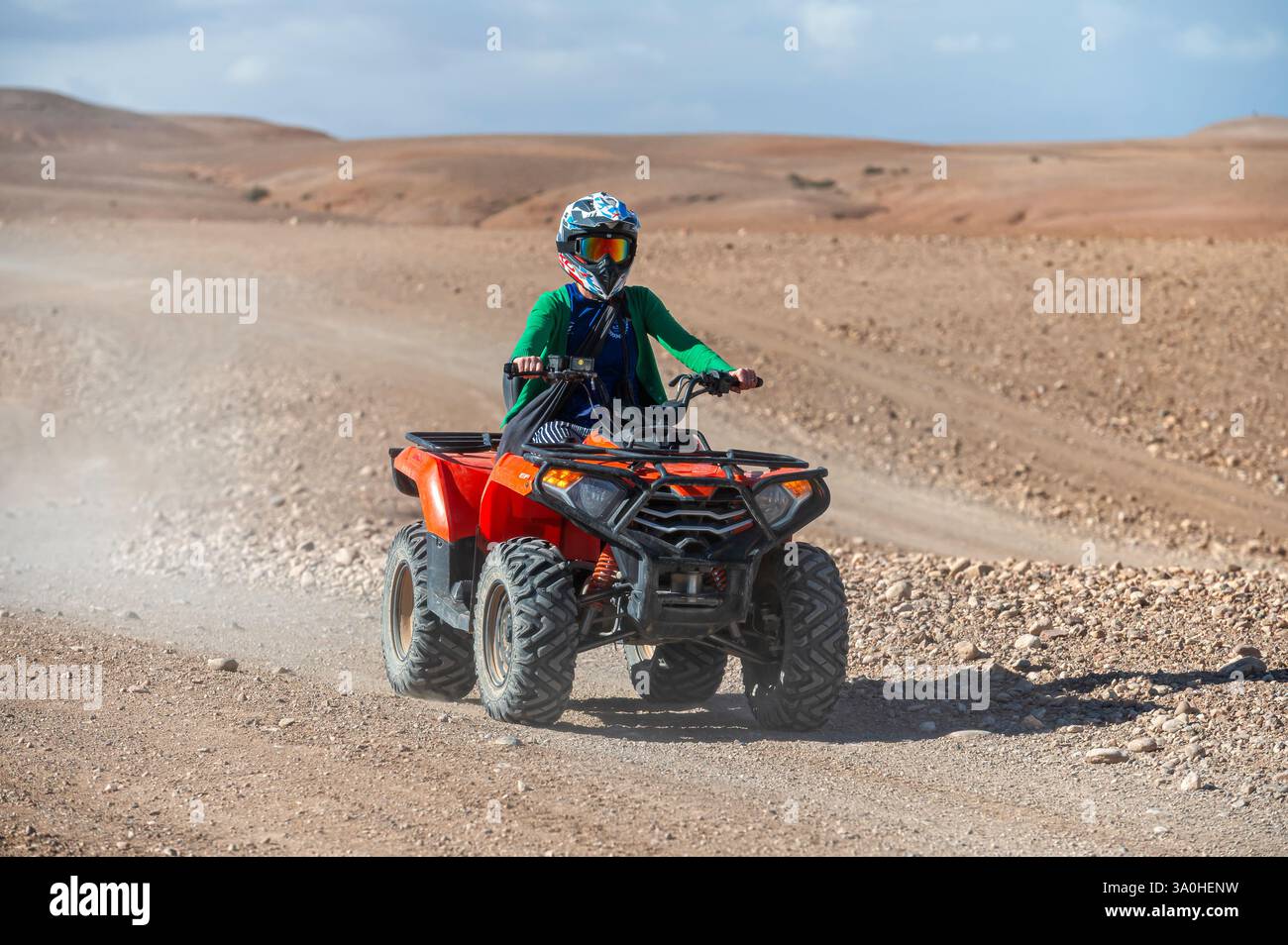 Agafay Desert, Morocco - February 16, 2025: Tourists enjoy an exciting ...