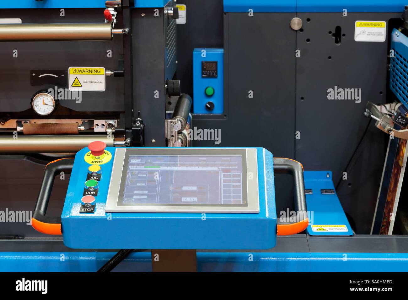 Touchscreen control panel of modern industrial equipment. Selective focus. Stock Photo