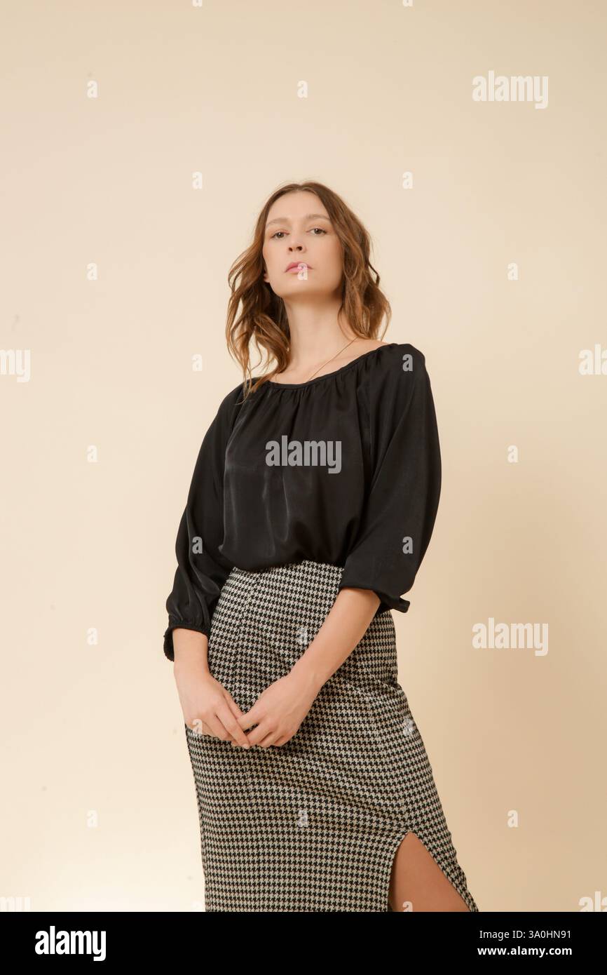 White blouse black skirt hi-res stock photography and images - Alamy