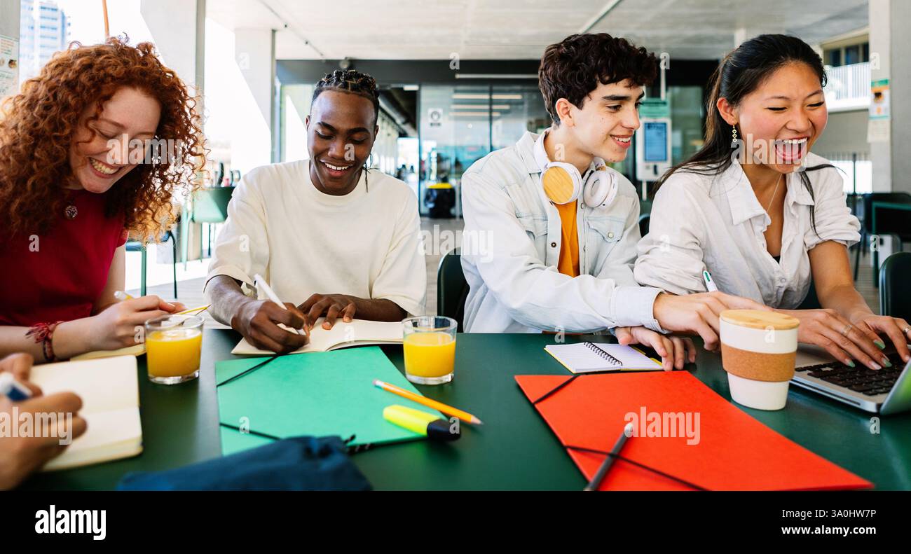 High school teenage students studying together at campus Stock Photo ...