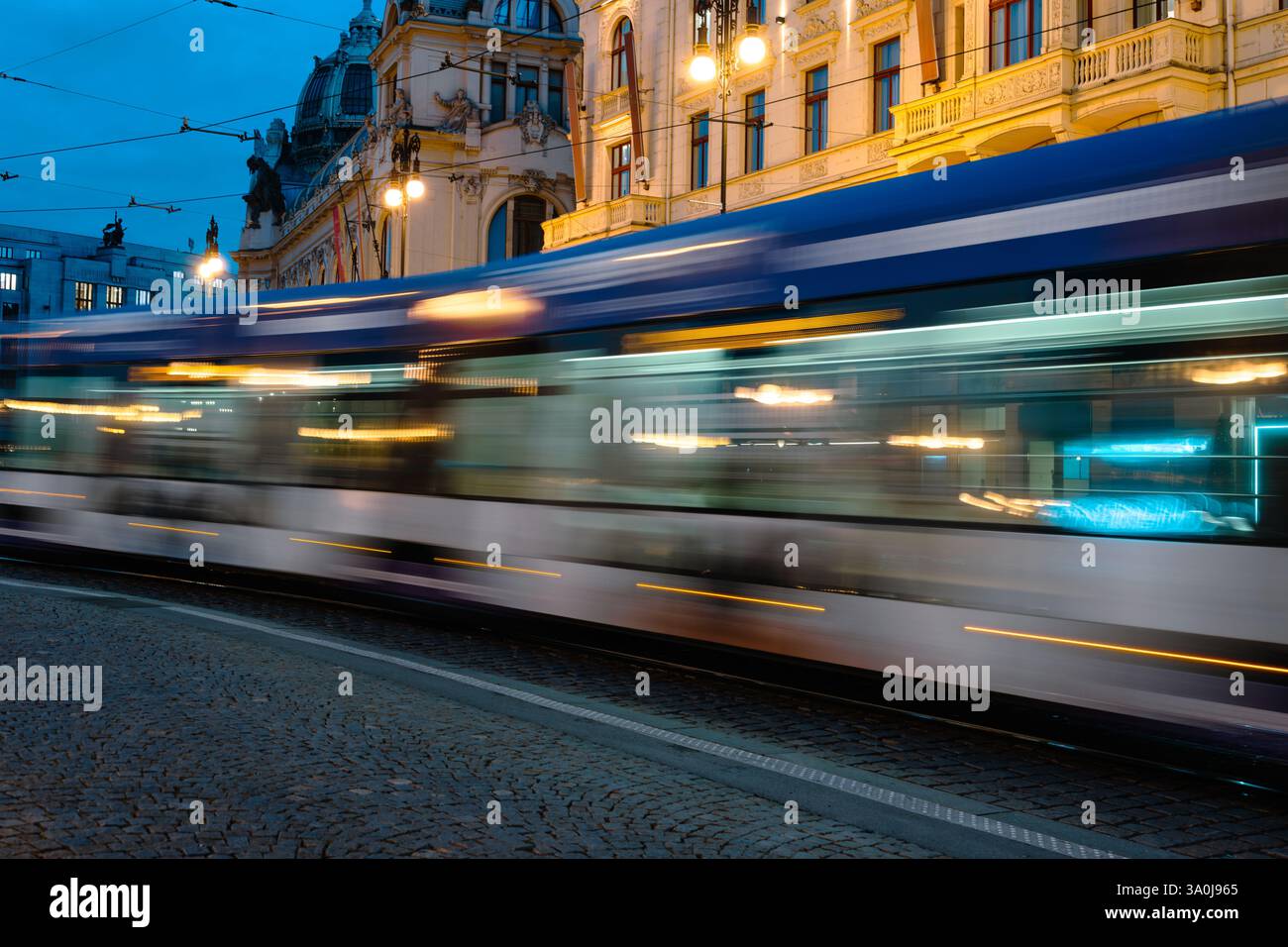 Tram Trails Illuminate A Night Prague Street, Fast-Moving Public ...