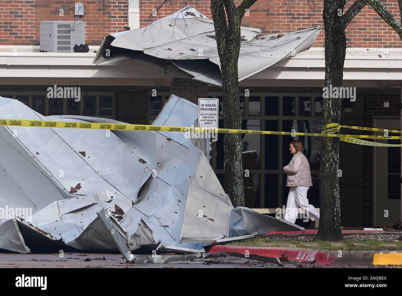 Damage from the roof that was sheered off by high by winds sits in