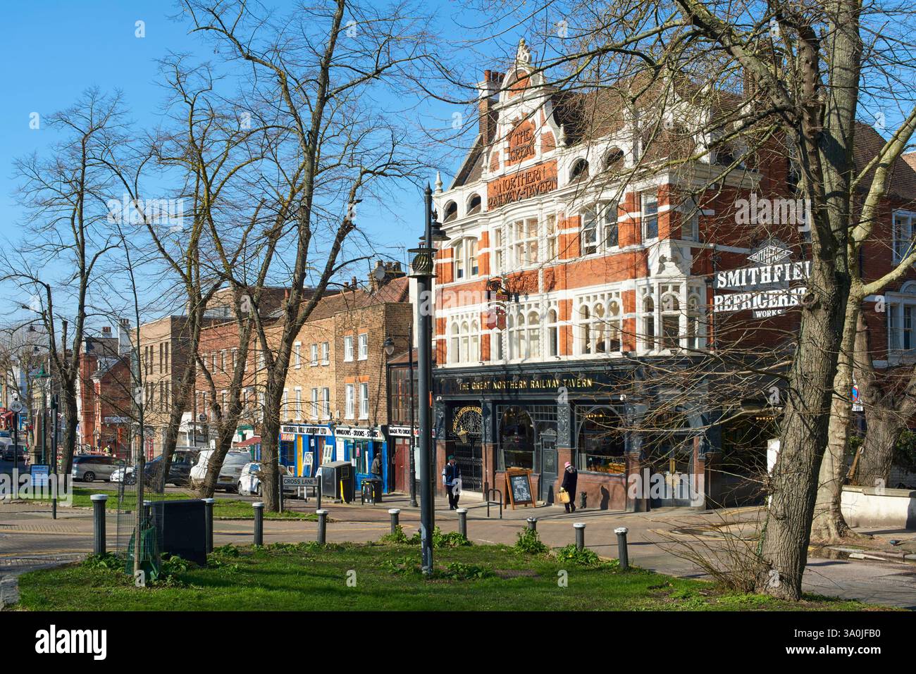 Hornsey High Street, London UK, with shops and the Great Northern Railway Taven Stock Photo