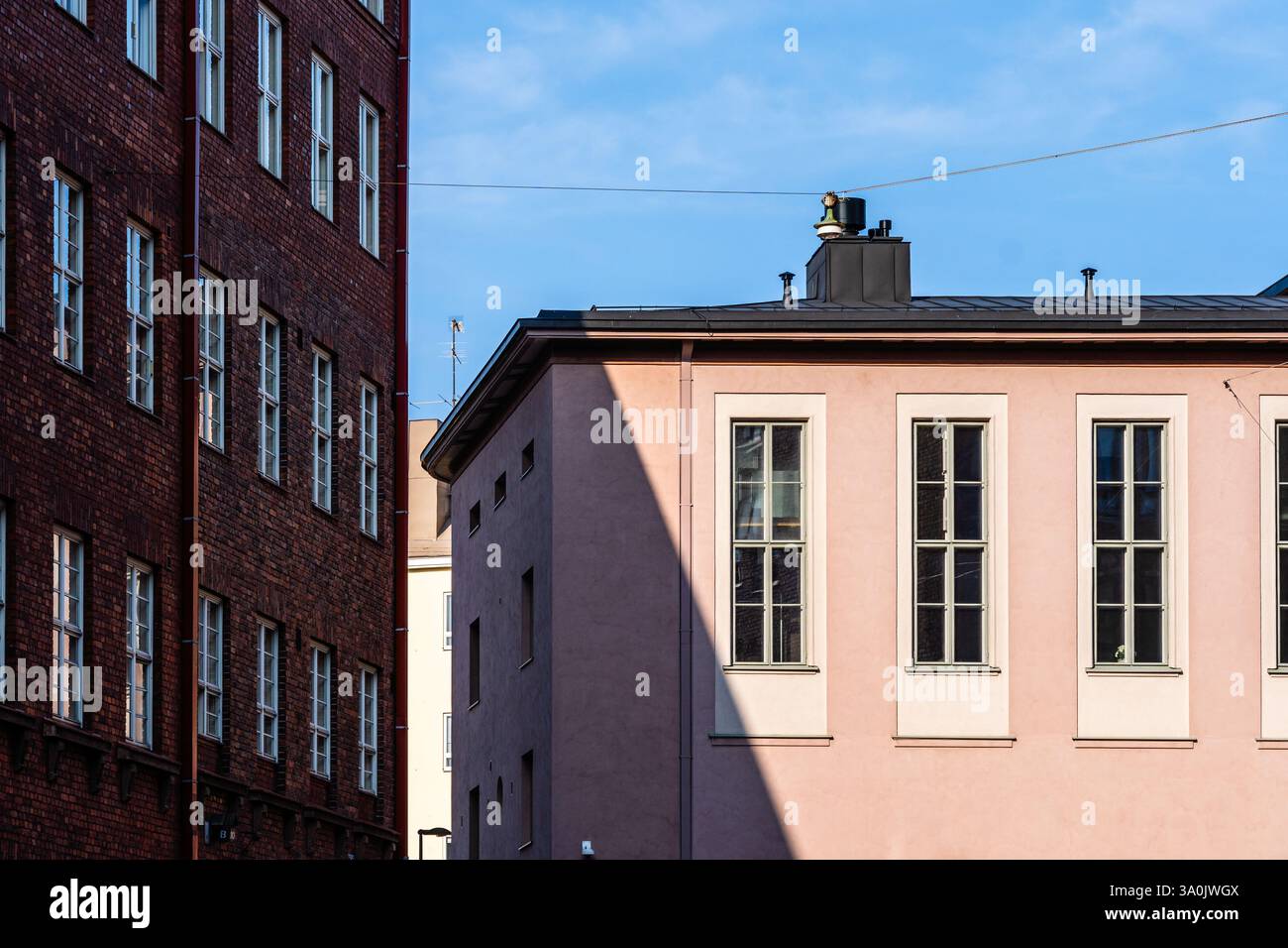 Architectural details of brick and stucco buildings in Helsinki ...