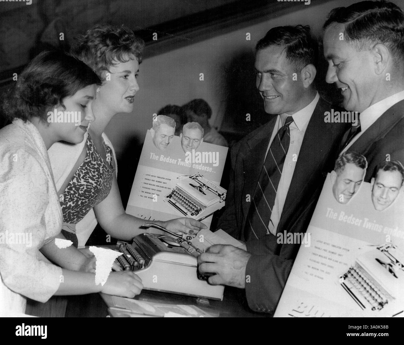 Bedser twins show office girls typewriters at Hordens. L to R: Miss ...