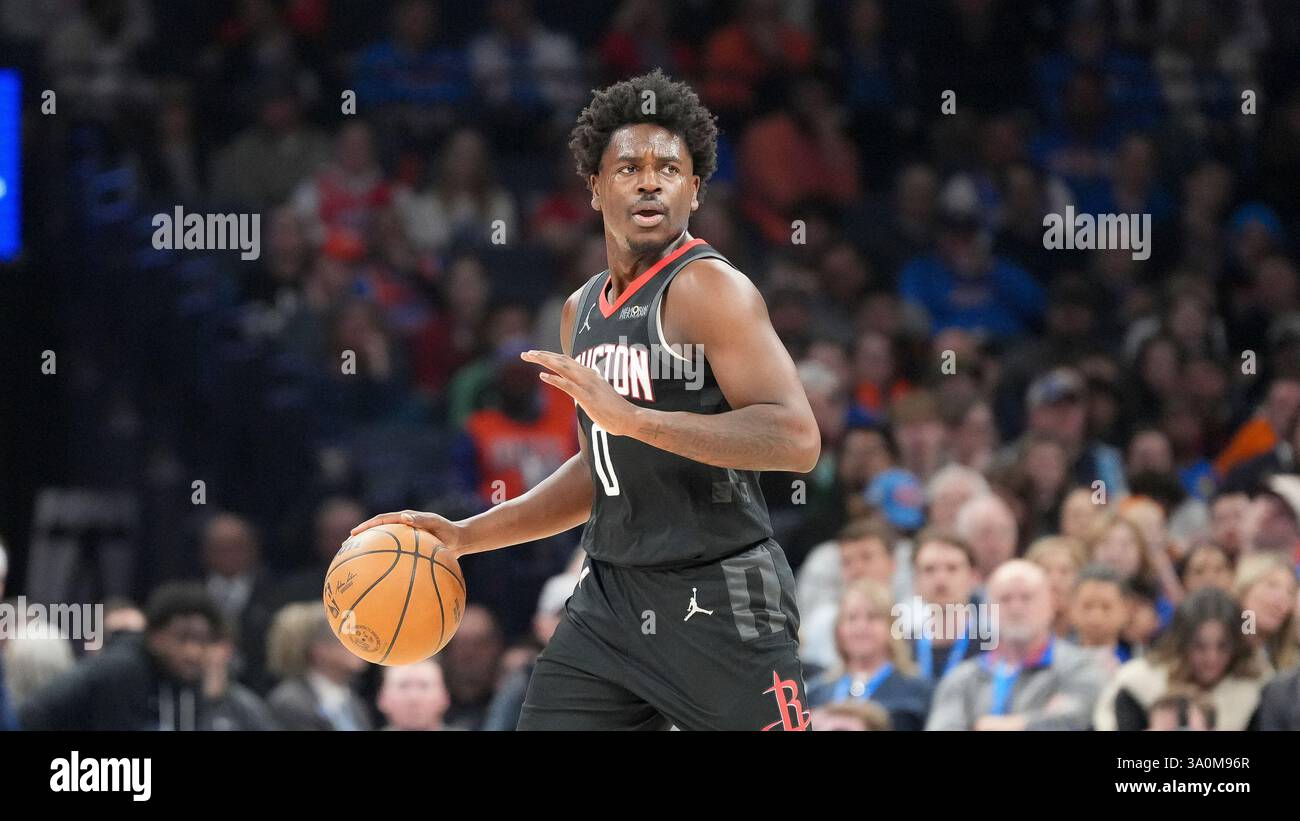 Houston Rockets guard Aaron Holiday pushes down the court during the ...