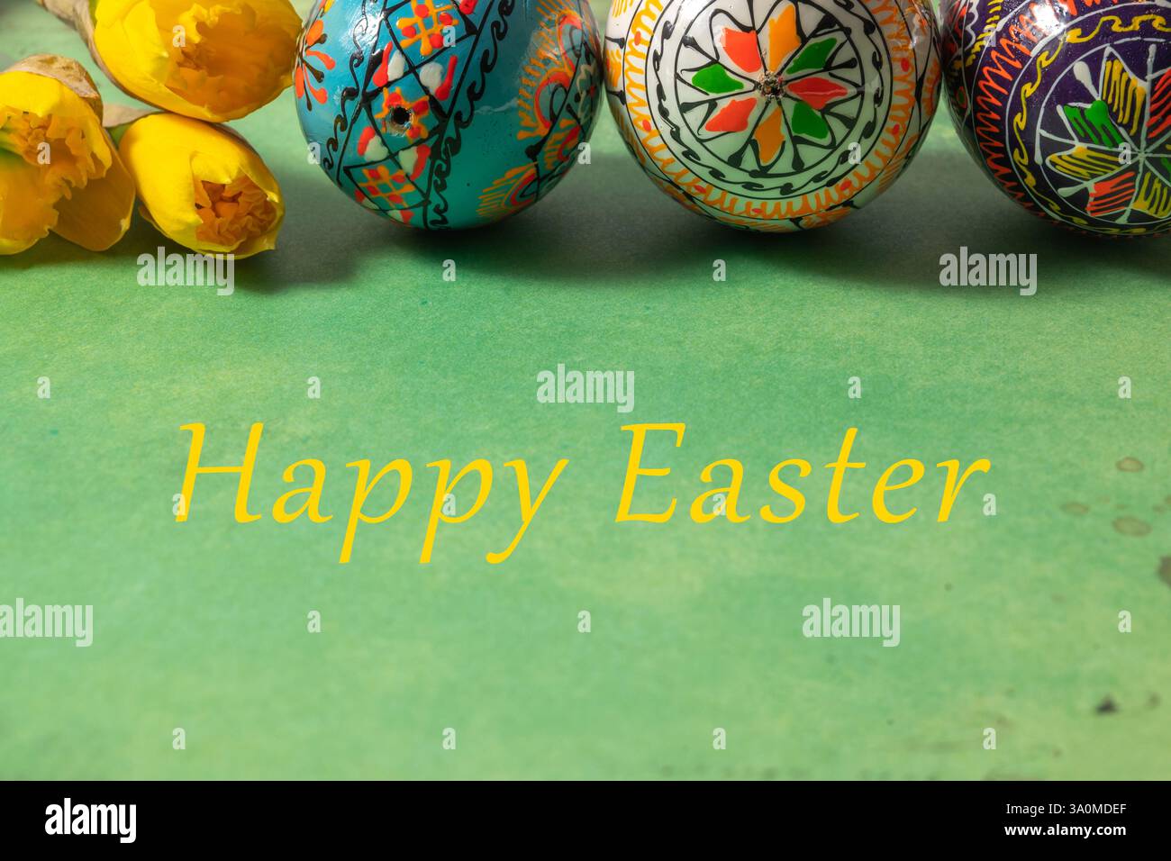 Happy easter flat lay with early spring flowers and easter eggs against ...