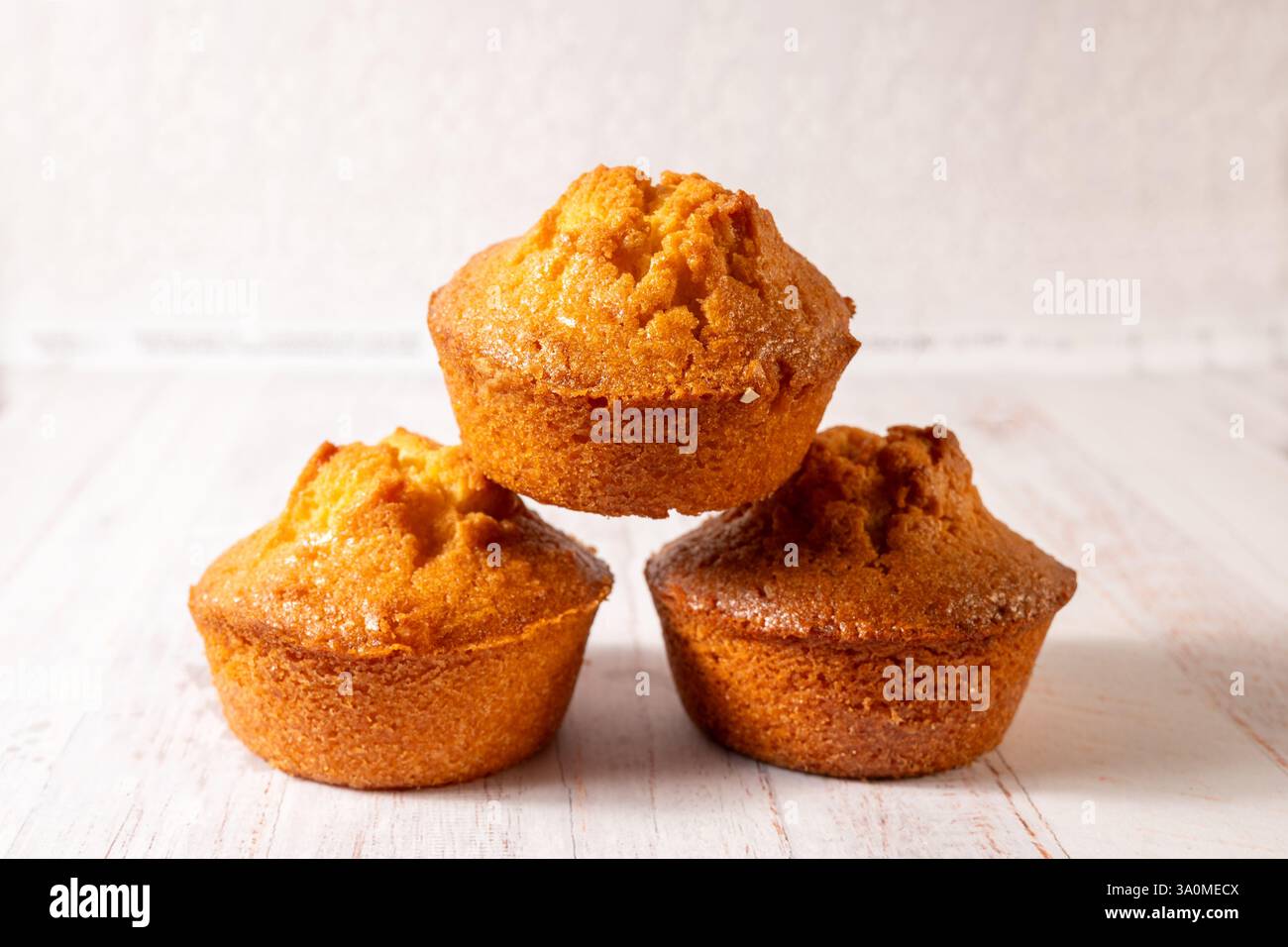 homemade lemon muffins on off white background Stock Photo