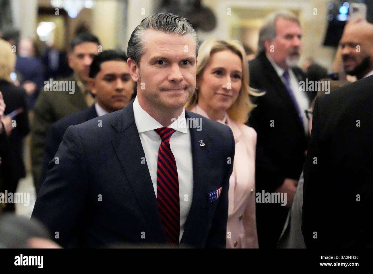 Defense Secretary Pete Hegseth, left, and his wife Jennifer Rauchet ...