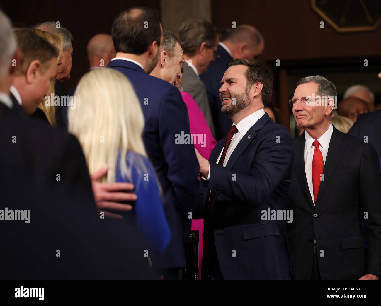 Vice President JD Vance greets members of Congress as he arrives for ...