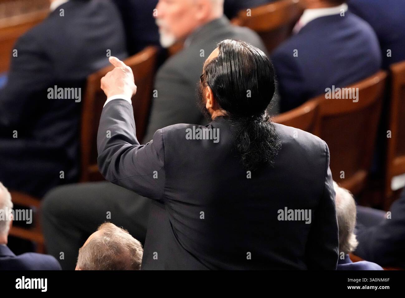 Rep. Al Green, D-Texas, points as President Donald Trump addresses a joint session of Congress
