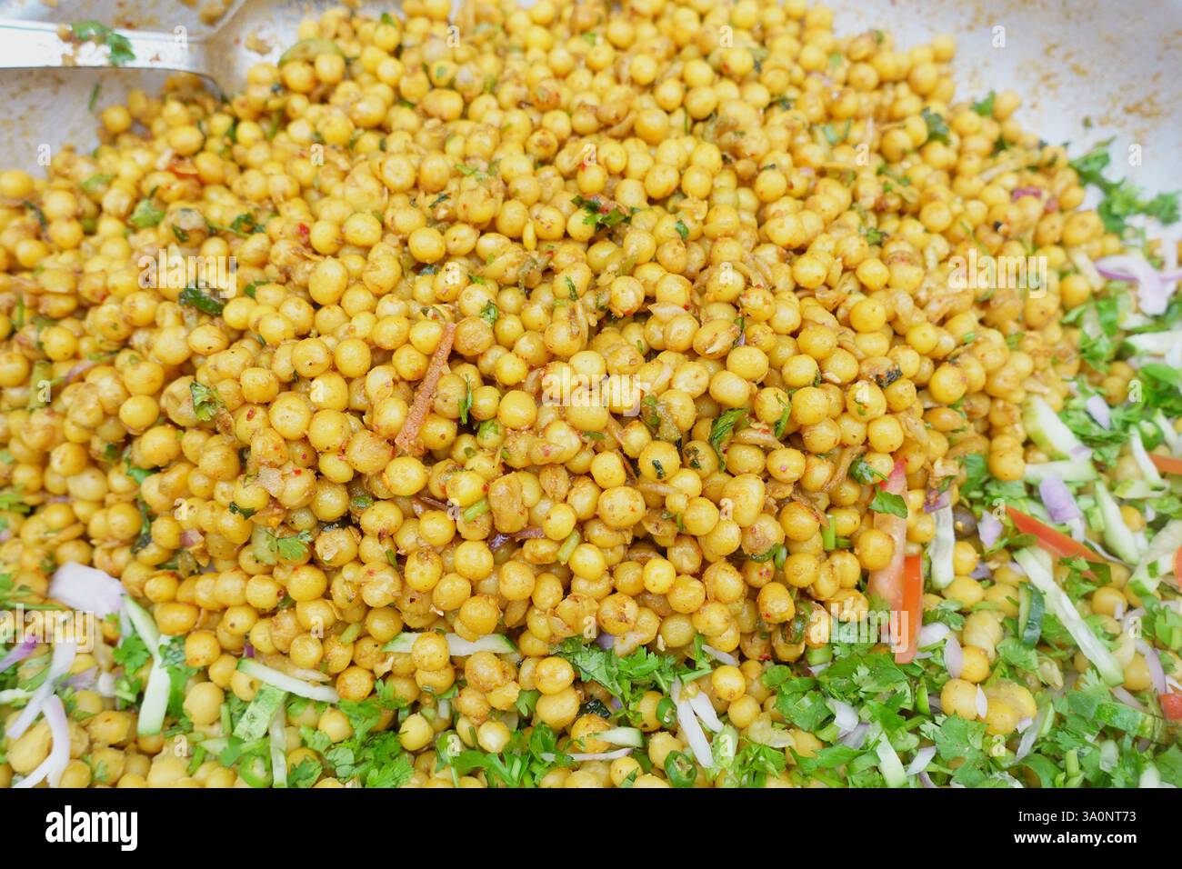 Colorful chickpea salad served at a street market in India Stock Photo