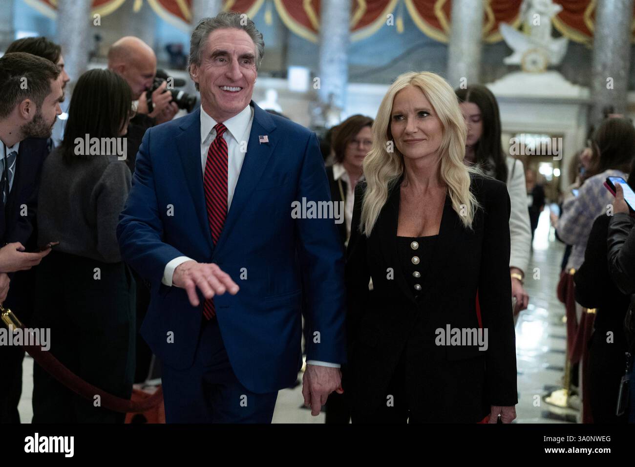 Secretary of the Interior Doug Burgum and his wife Kathryn Burgum walks ...