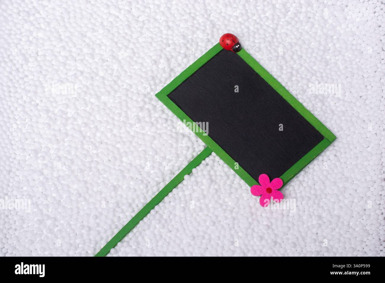Black Empty Sign Board with floral icon Stock Photo - Alamy