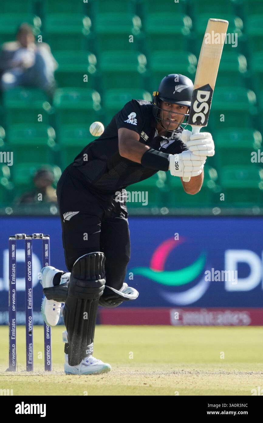 New Zealand's Rachin Ravindra plays a shot during the ICC Champions ...