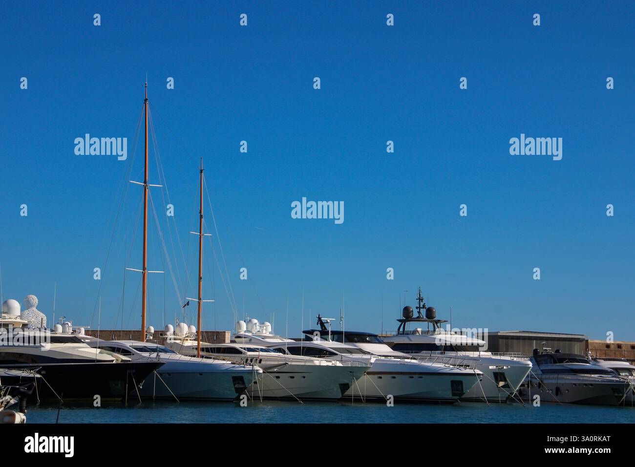 Luxury yachts docked in French riviera marina under a clear sky Stock ...