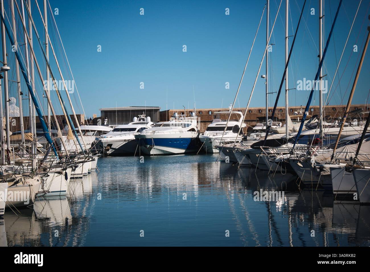 Luxury yachts docked in French riviera marina under a clear sky Stock ...