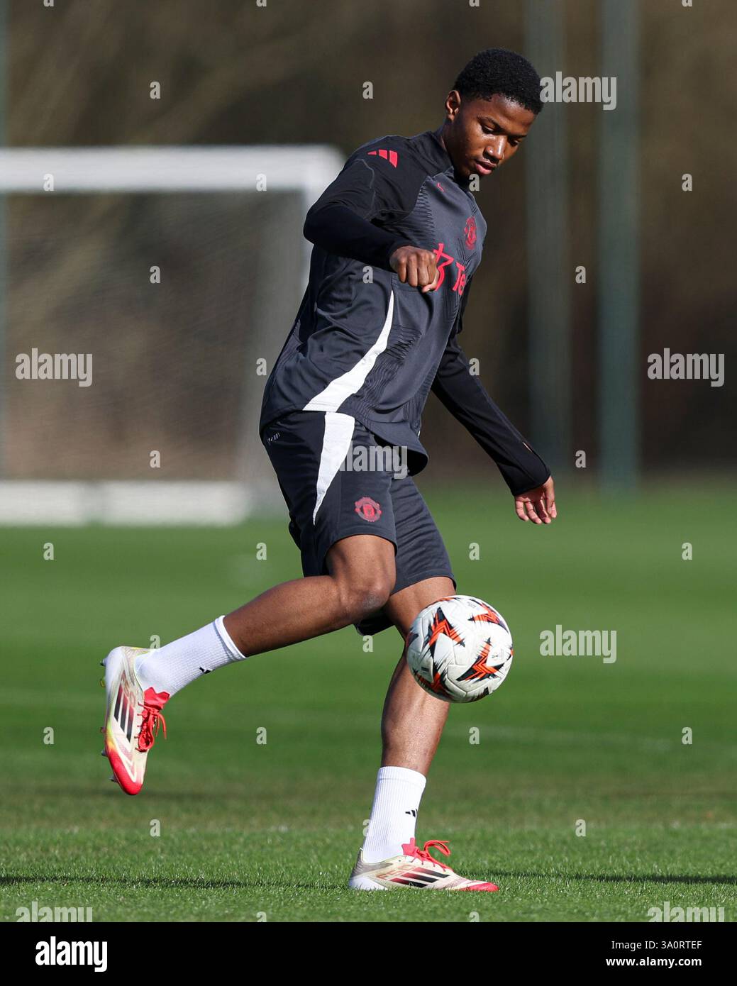 Manchester, UK. 05th Mar, 2025. Chido Obi-Martin of Manchester United during the Manchester United FC Training session ahead of the UEFA Europa League match vs Real Sociedad at Carrington Training Centre, Manchester, England, United Kingdom on 5 March 2025 Credit: Jake Kirkman/Every Second Media Credit: Every Second Media/Alamy Live News Stock Photo